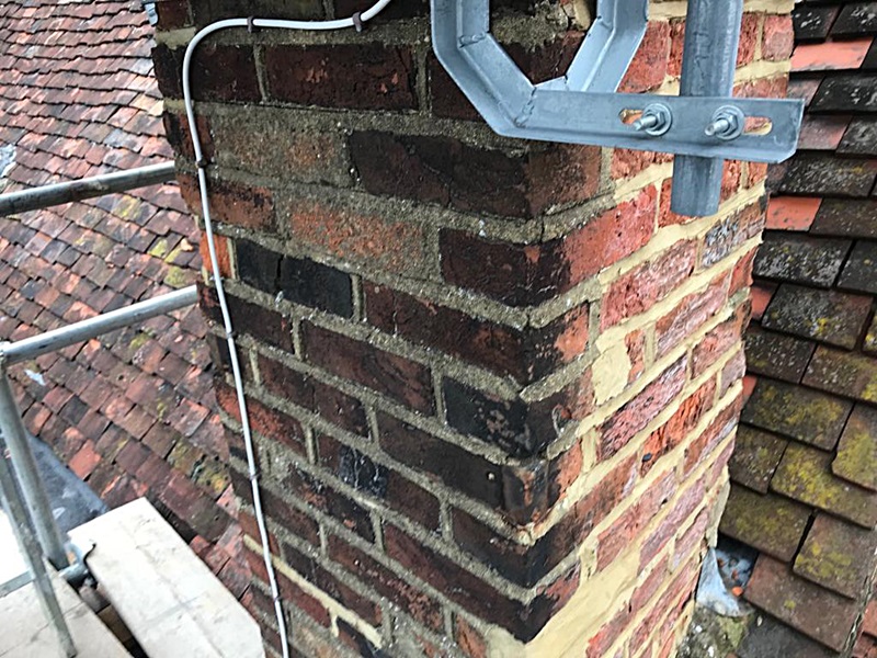 Chimney repairs with reclaimed bricks